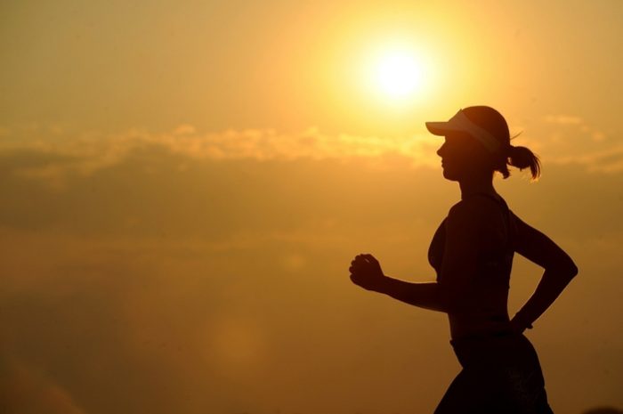 person running a workout which can be tracked with an Apple Watch