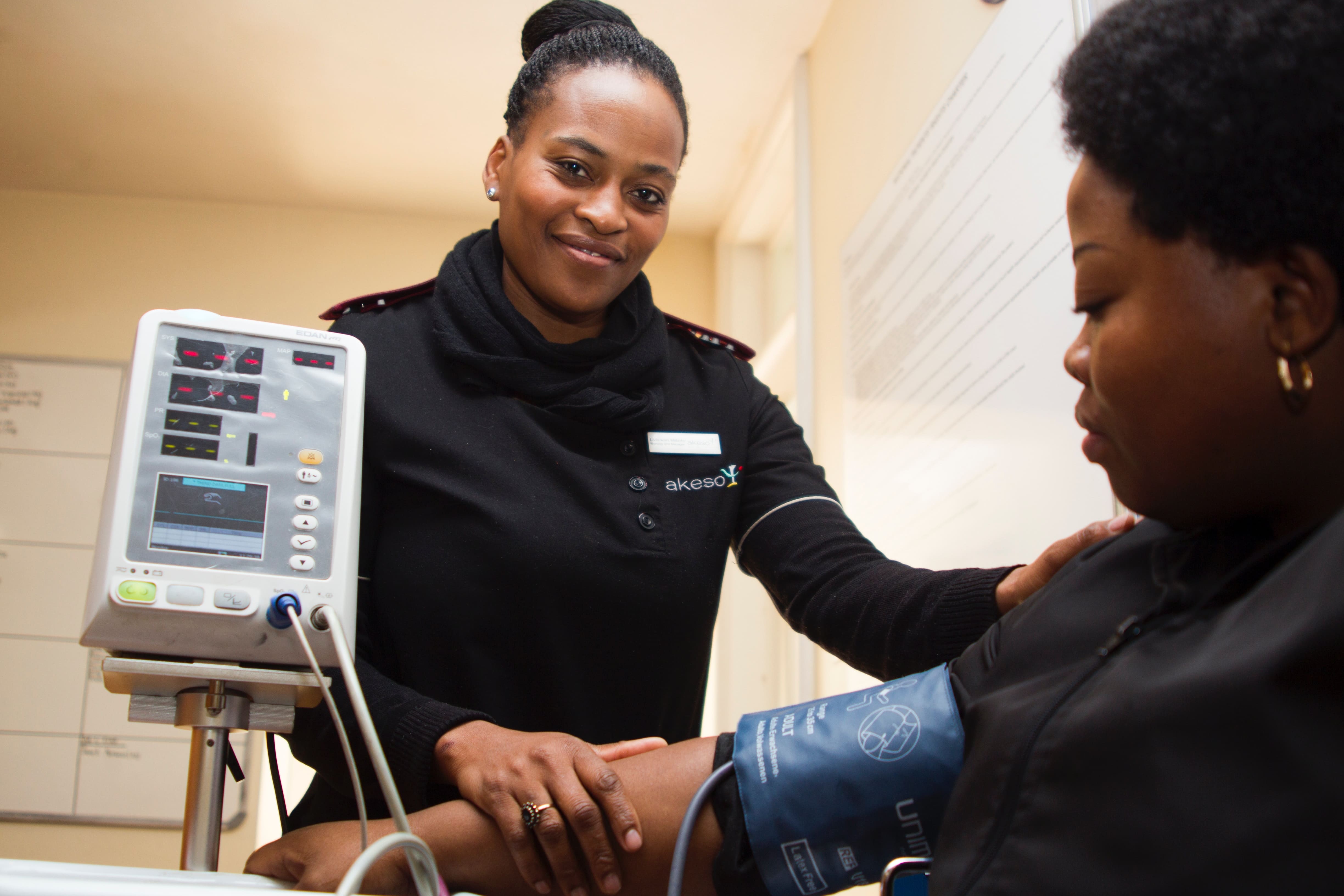 Nurse taking blood pressure