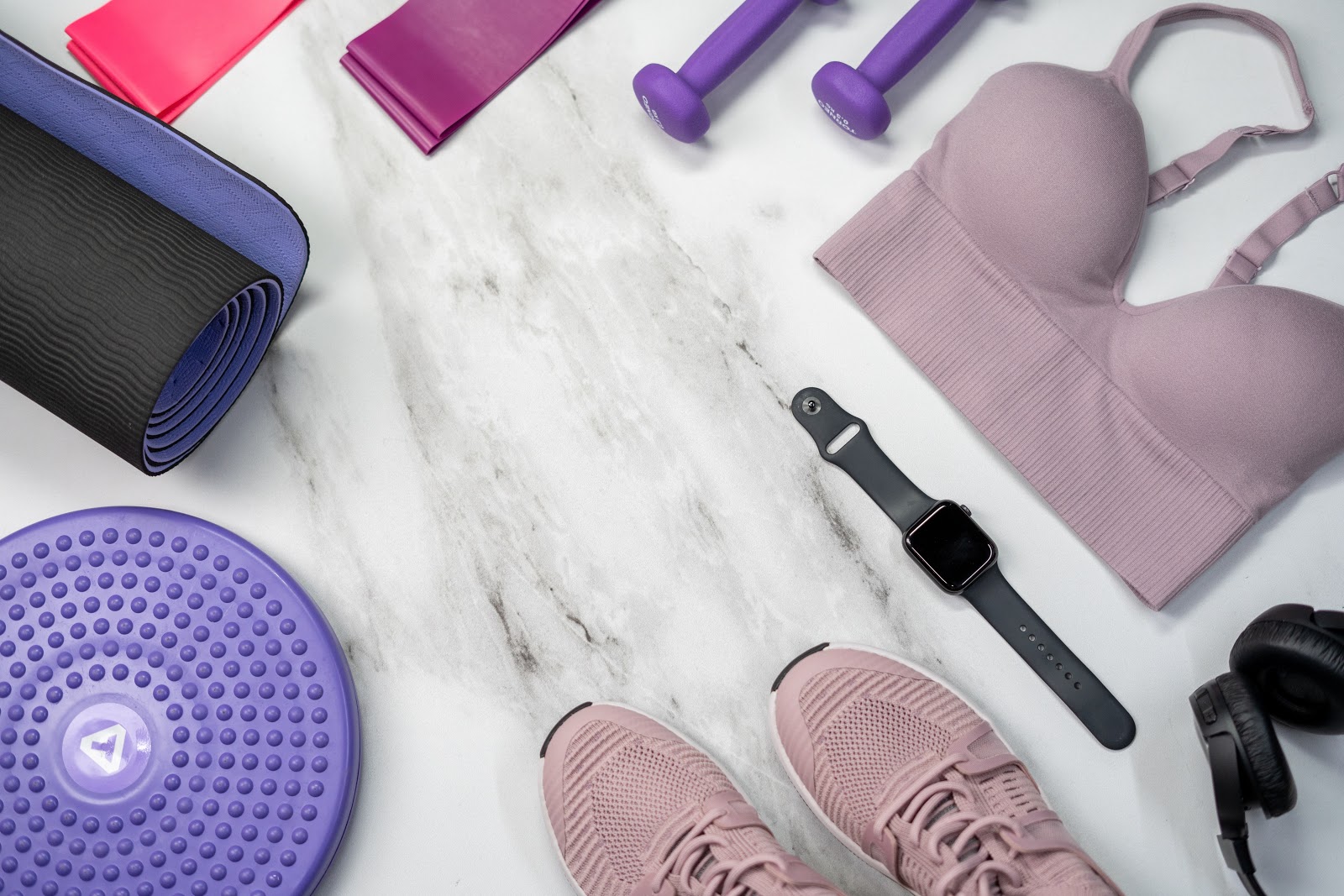 Sports equipment and fitness tracker ready for a workout